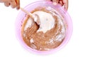 Mix cocoa powder and flour in a plastic bowl membuat kue muffin Royalty Free Stock Photo